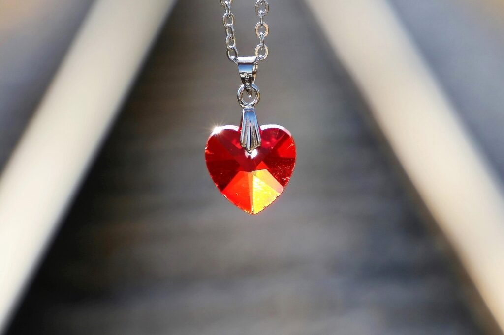 red heart medallion, love symbol, lost love, railway, jewel, jewelry, chain, crystal, necklace, pendant, outdoor, nature, lost love, necklace, necklace, necklace, necklace, necklace, pendant, pendant